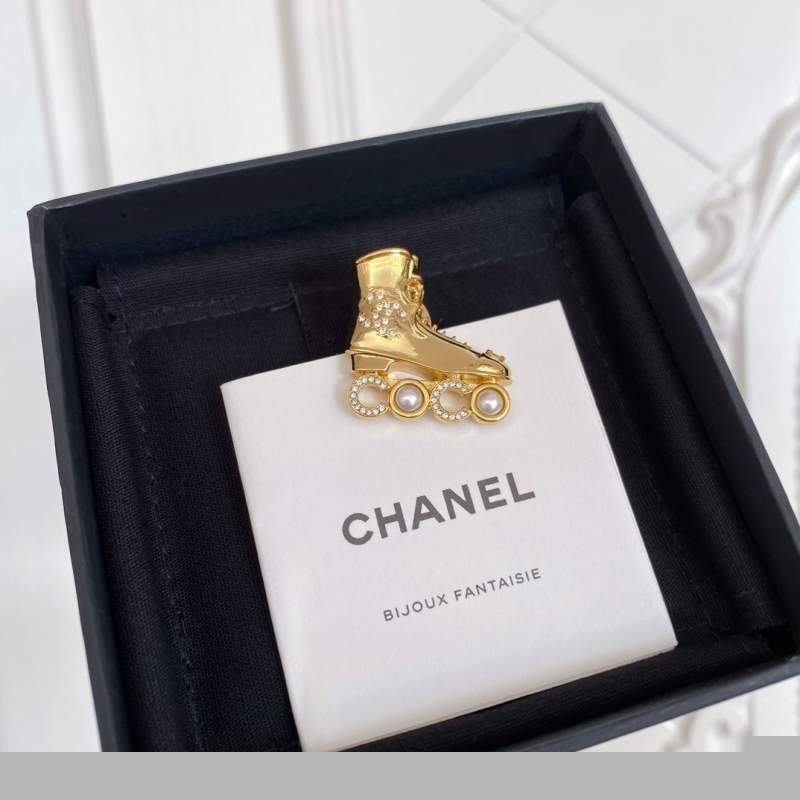 Ch*el brooches